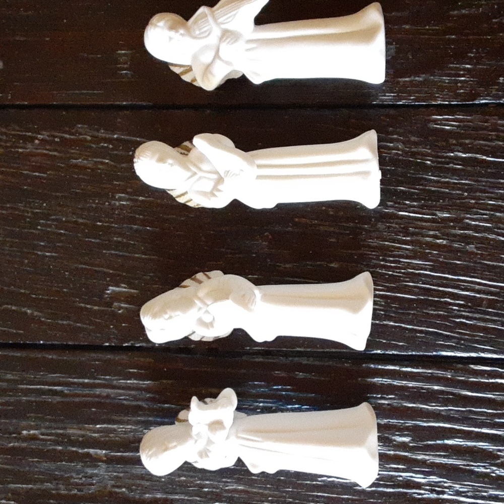 Set of 4  Porcelain Angels figurines each with a musical instrument, Xmas gifts